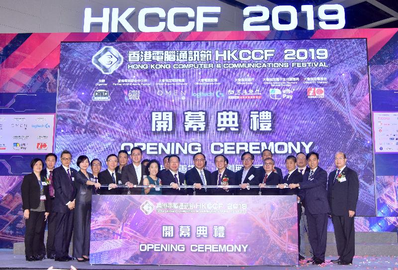 The Secretary for Innovation and Technology, Mr Nicholas W Yang (front row, seventh right), joins the Chairman of the Chamber of Hong Kong Computer Industry, Mr Reggie Wong (front row, seventh left); Legislative Council Member Dr Lo Wai-kwok (front row, fifth right); the Under Secretary for Innovation and Technology, Dr David Chung (front row, fourth right); the Government Chief Information Officer, Mr Victor Lam (front row, fourth left); and other guests to officiate at the opening ceremony of the Hong Kong Computer & Communications Festival 2019 today (August 23).